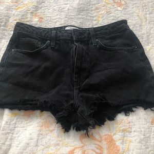black ripped jean shorts